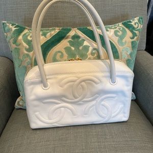 Chanel; 3 CC logo pattern embedded at the front and back. Excellent condition.